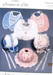232 SMOCKED BABY BONNET,SUNBONNET & BABY BIBS PATTERN